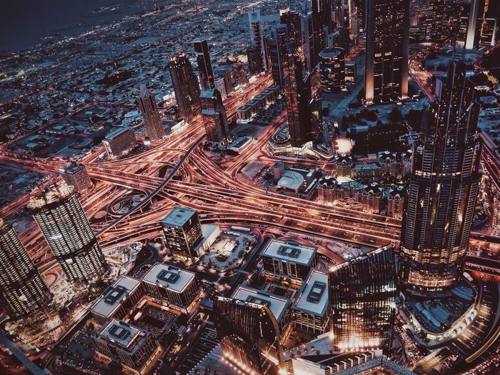 High angle view of cityscape seen through burj khalifa at night