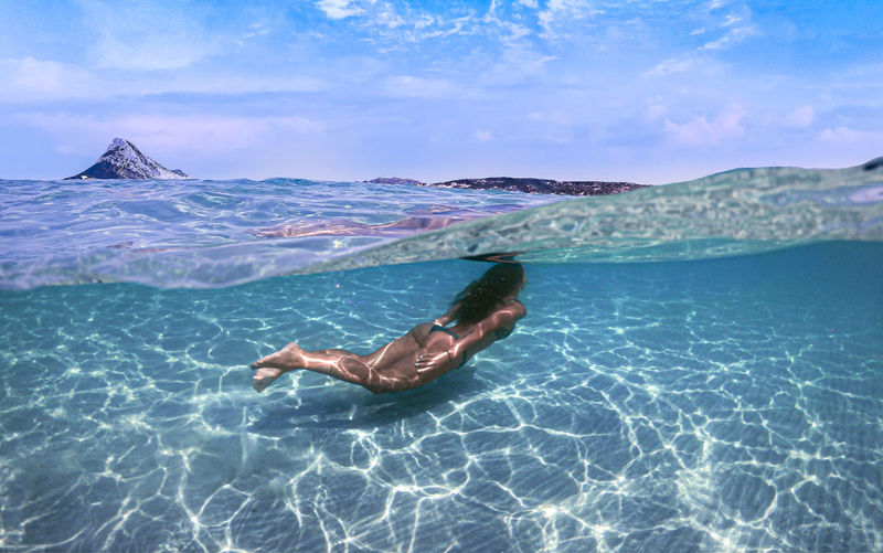 Girl swimming in the sea 