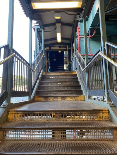 Low angle view of empty staircase at railroad station on white plains road new york usa summer 2020