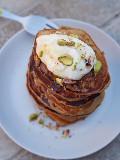 High angle view of pancakes in plate on table