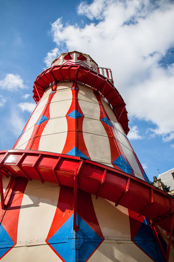 Low angle view of helter skelter against sky