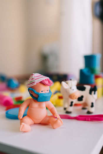 Close-up of toys on table at home