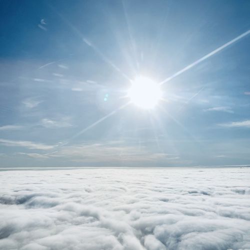 Scenic view of cloudscape against blue sky on sunny day