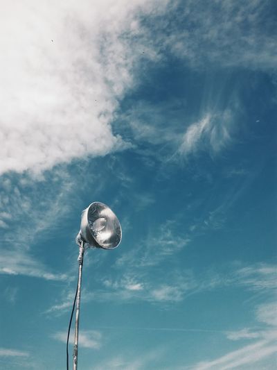 Lamp and low angle view of sky 