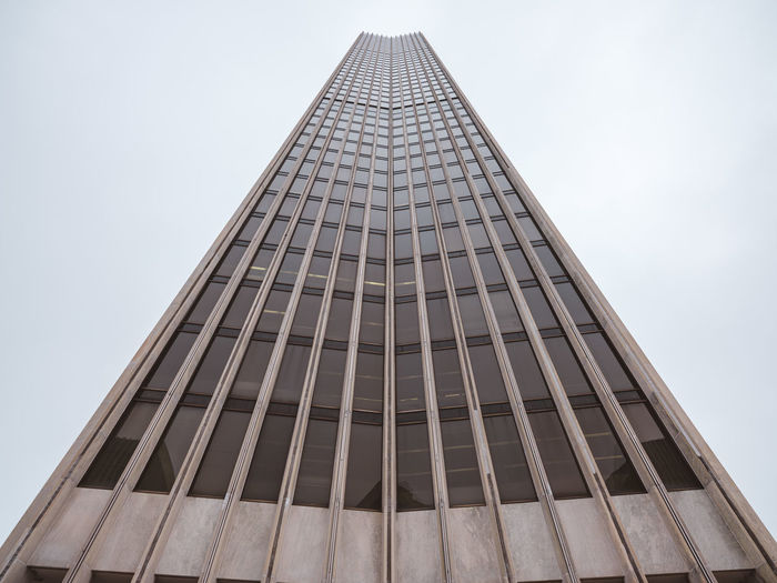 Low angle view of modern building against clear sky