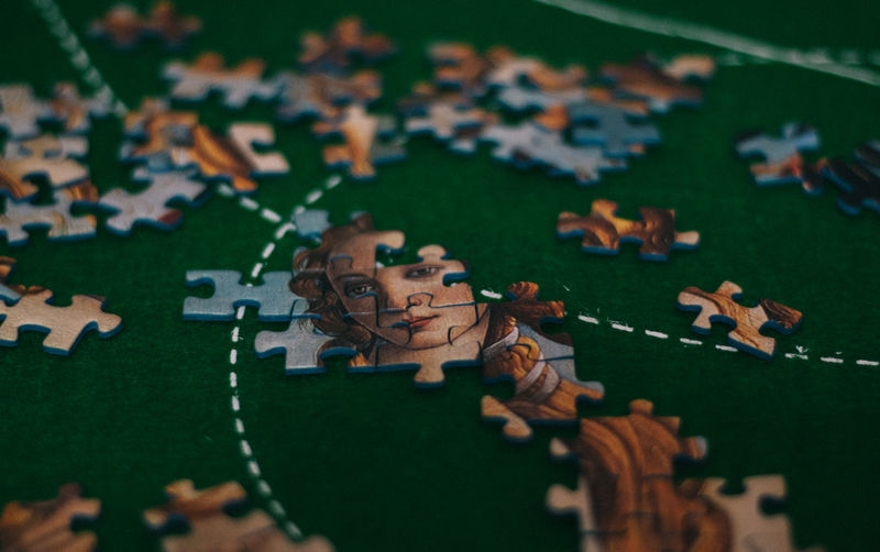 High angle view of puzzle pieces on table