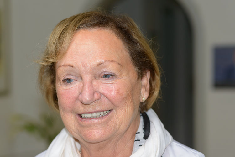 Close-up of senior woman at home