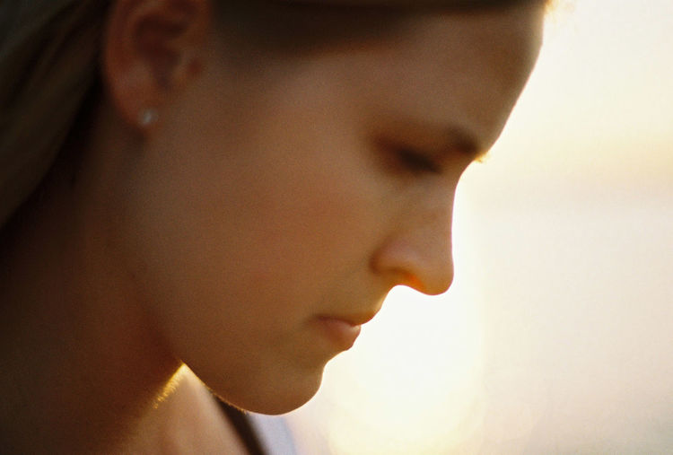 Close-up portrait of boy looking away