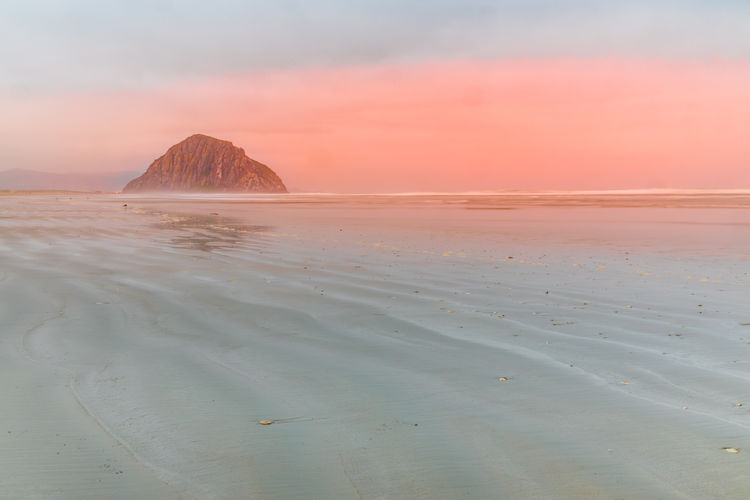 SCENIC VIEW OF SEA DURING SUNSET