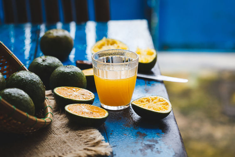 Fresh orange juice on table