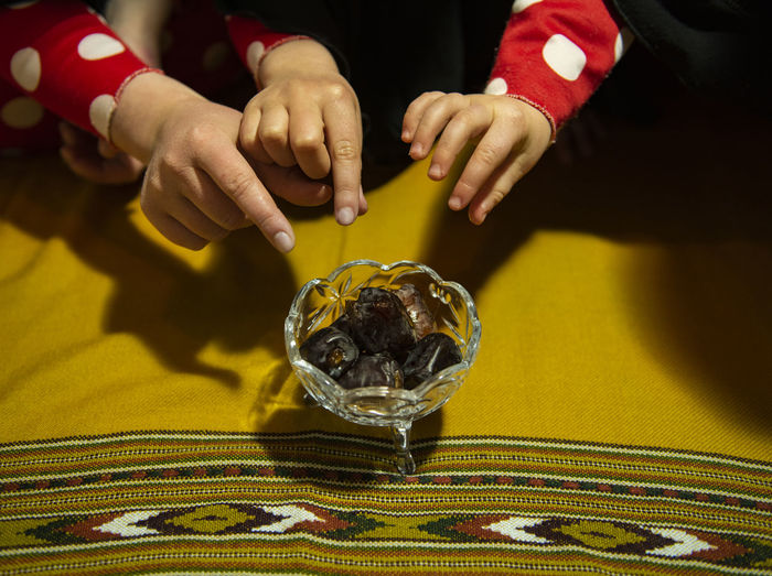 Kids eating dates for ramadan 