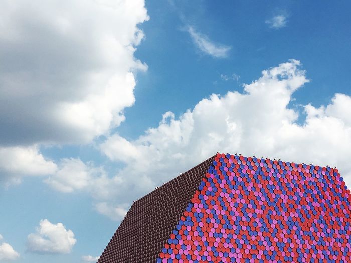 Low angle view of london mastaba against sky 