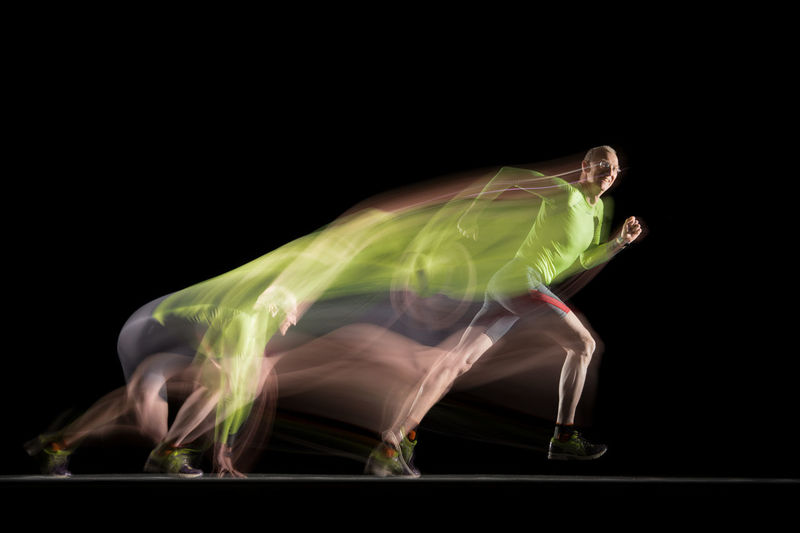 The runner moves between two permanent lights. at the end of the exposure, a flash makes him visible