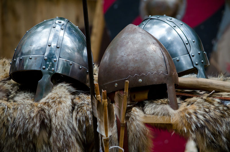Traditional helmets and weapons with fur coat