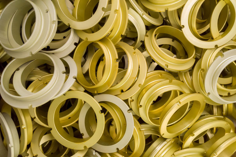 A batch of sulfur oxidated anodized aluminium parts.