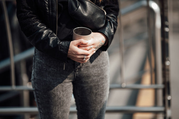 Man holding coffee cup