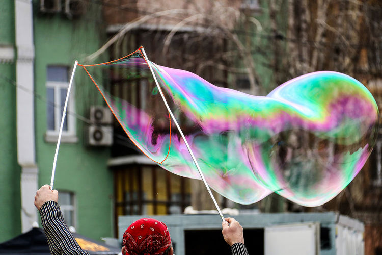 Street performer making soap bubble