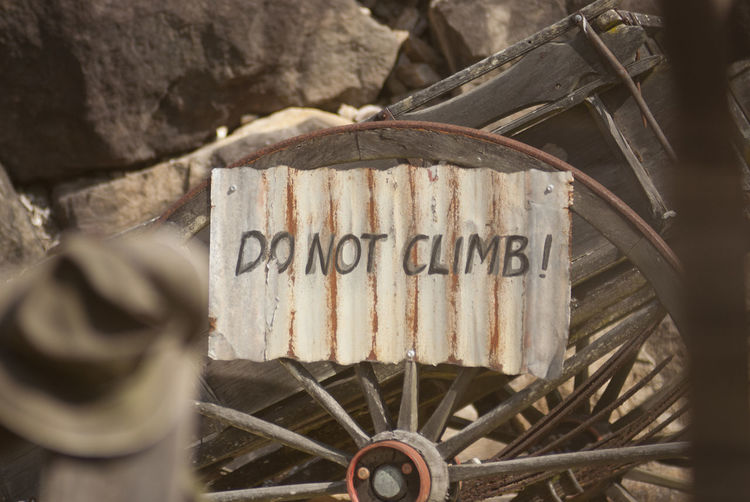 Warning sign on wagon wheel