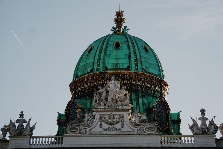 Low angle view of hofburg against sky in city