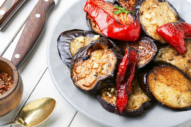 Grilled eggplant and grilled bell pepper on a plate