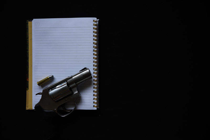 High angle view of pen on table against black background