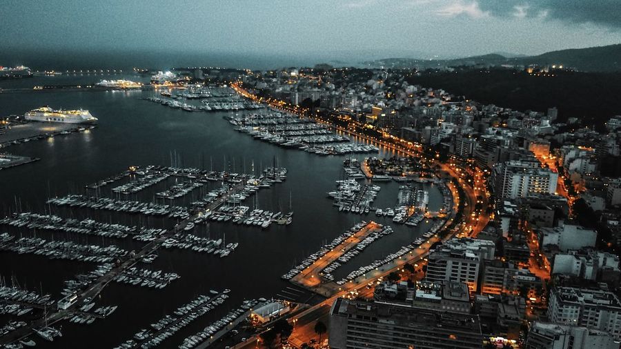 High angle view of illuminated buildings in city at night
