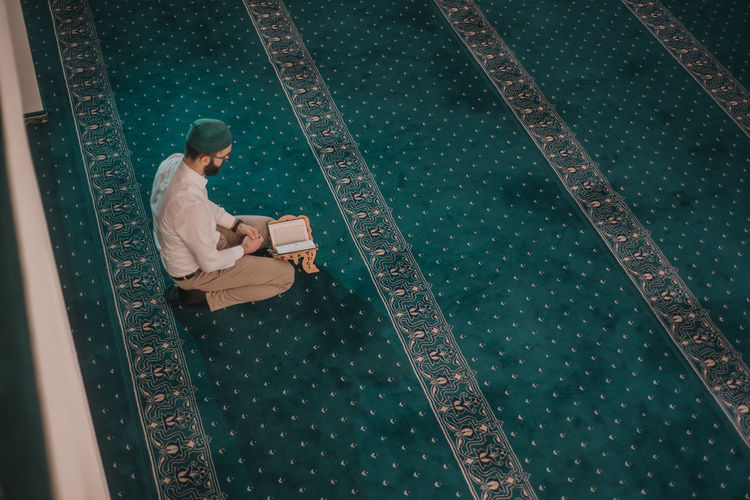 High angle view of man using mobile phone