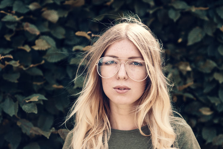 Young women with long blond hair Cool EyeEm Best Shots Fashion Glasses Lifestyle Millenials Portrait Of A Woman Retro TwentySomething Accessories Blond Hair Coolness Eyewear Germany Hipster Look Model Outdoors Vintage Windy Women women around the world Women Of EyeEm Young Adult Young Women