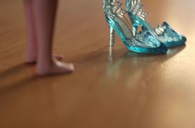 Close-up of high heels on table 