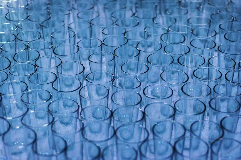 Full frame shot of empty water glasses arranged together