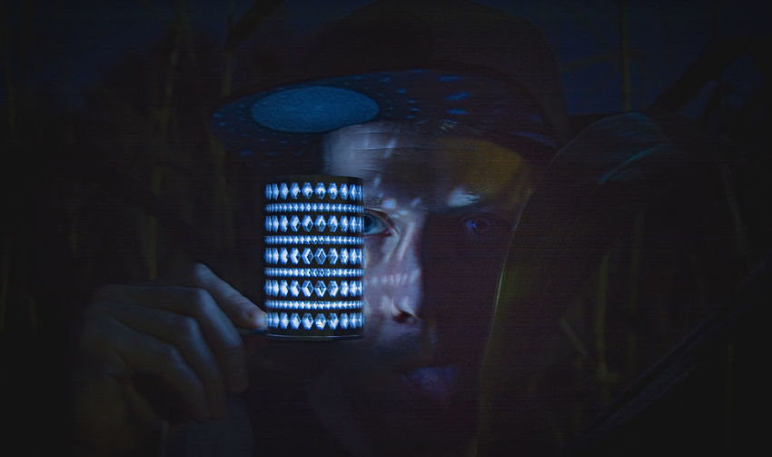 Digital composite image of man using mobile phone