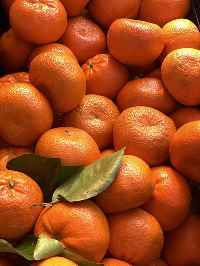 Full frame shot of mandarins at market stall