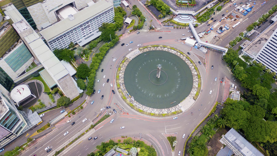 Aerial view of traffic circle in city