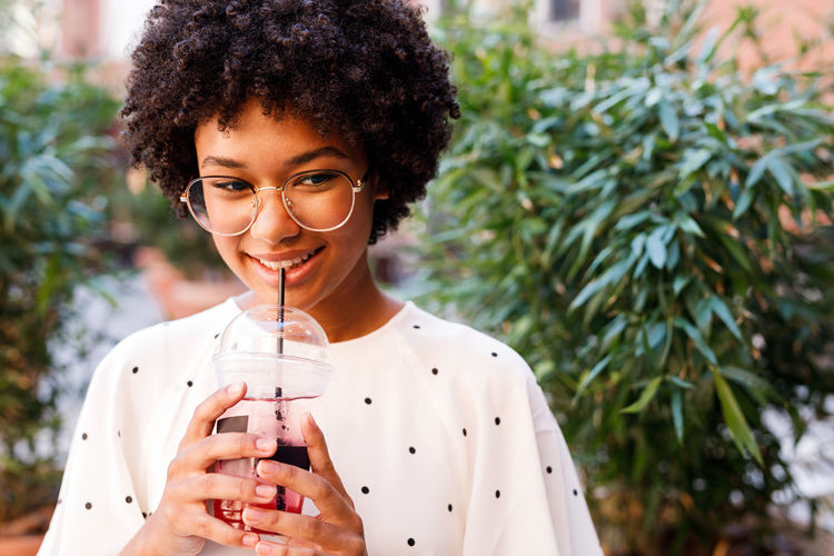 Woman Blogger Vlogger Photography Streaming Vacation Shooting Looking Social Media Girl Outdoors Online Drink Lifestyle Young African American Camera Holding Females One Person Real People