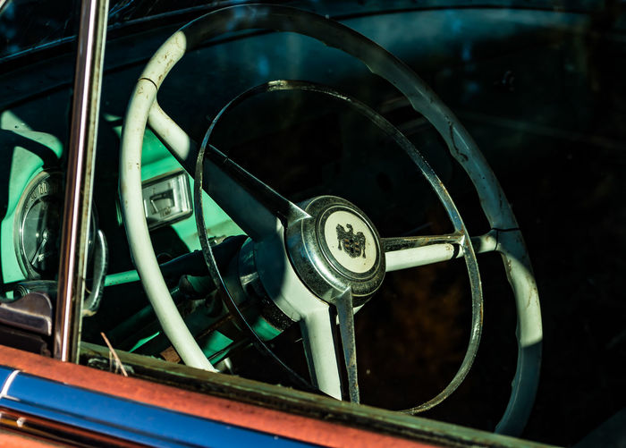 Close-up of old-fashioned steering wheel