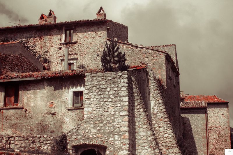 Low angle view of old building against sky