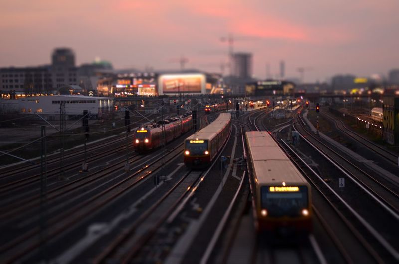 High angle view of trains on railroad tracks during sunset