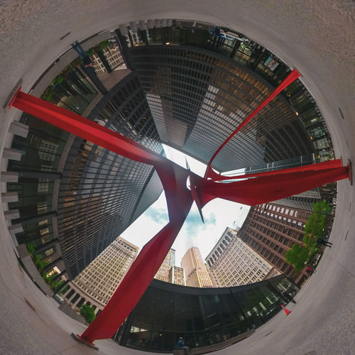 Low angle view of modern buildings against sky