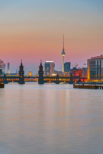 Sunset at the river spree in berlin with the famous television tower in the back