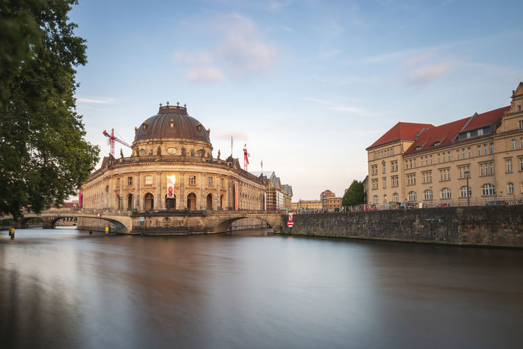 Long exposure of bode museum located on museum island berlin mitte at sunset against sky 