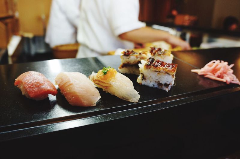 Close-up of sushi on marble