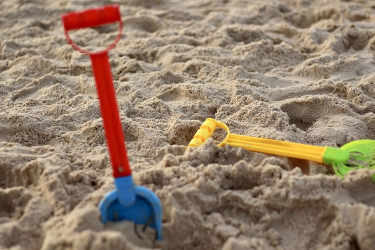Close-up of toy on sand