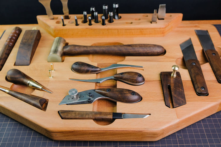 High angle view of tools on cutting board