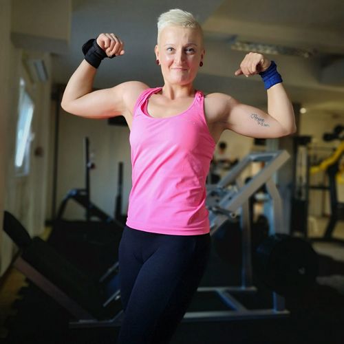 Portrait of female bodybuilder at gym