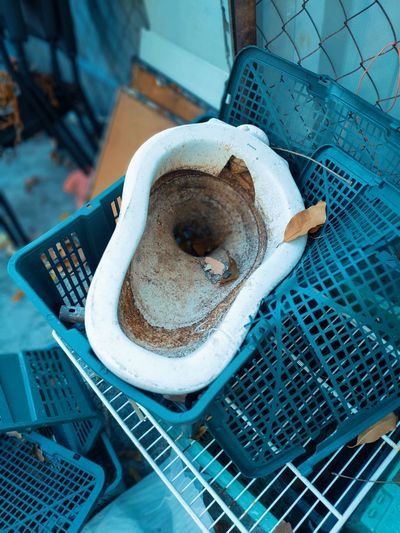 High angle view of abandoned toilet bowl
