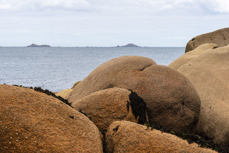 Rock formations in pink granite coast around perros-guirec in brittany, france