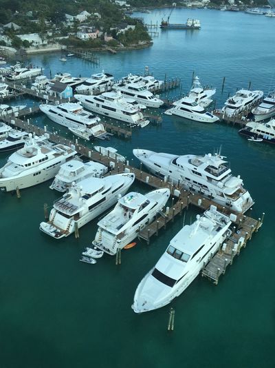 High angle view of yachts moored at harbor