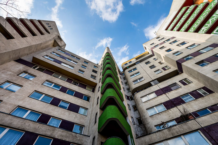 Low angle view of modern buildings against sky