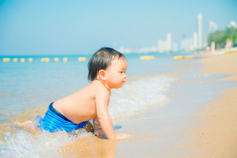 Boy looking at beach
