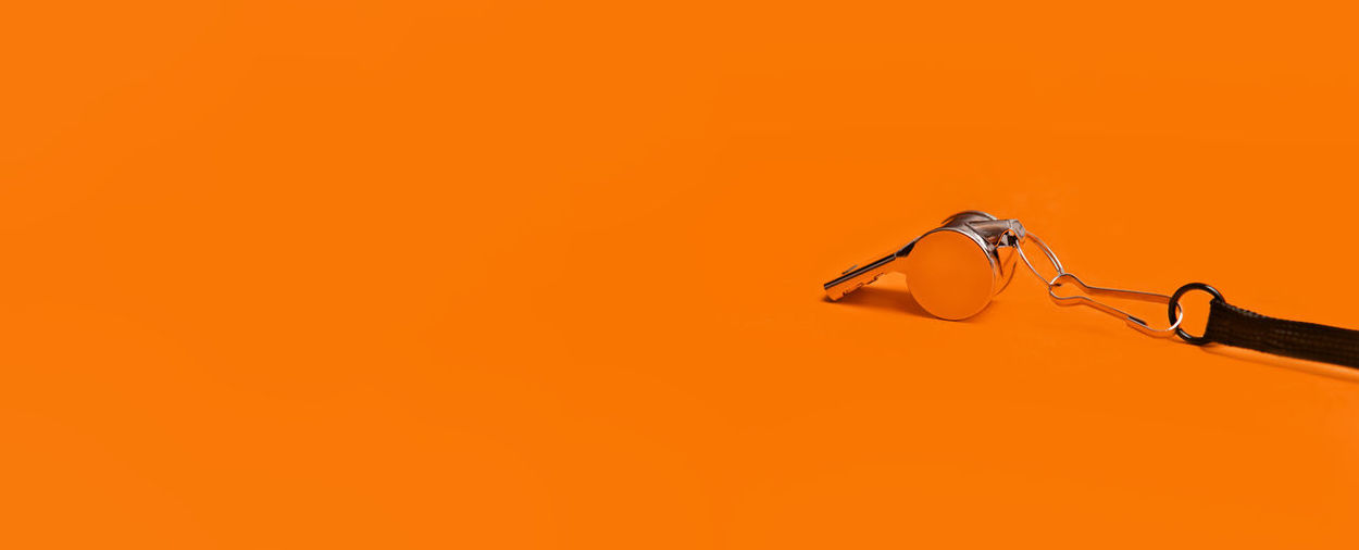 High angle view of woman with sunglasses against yellow background